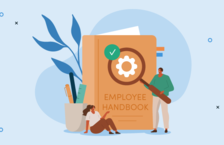 Two HR professionals writing an employee handbook